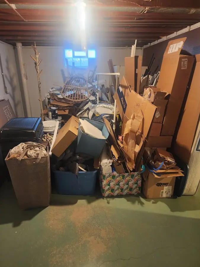 Roll-off dumpster container at job site for Construction Dumpster Rental in Hays